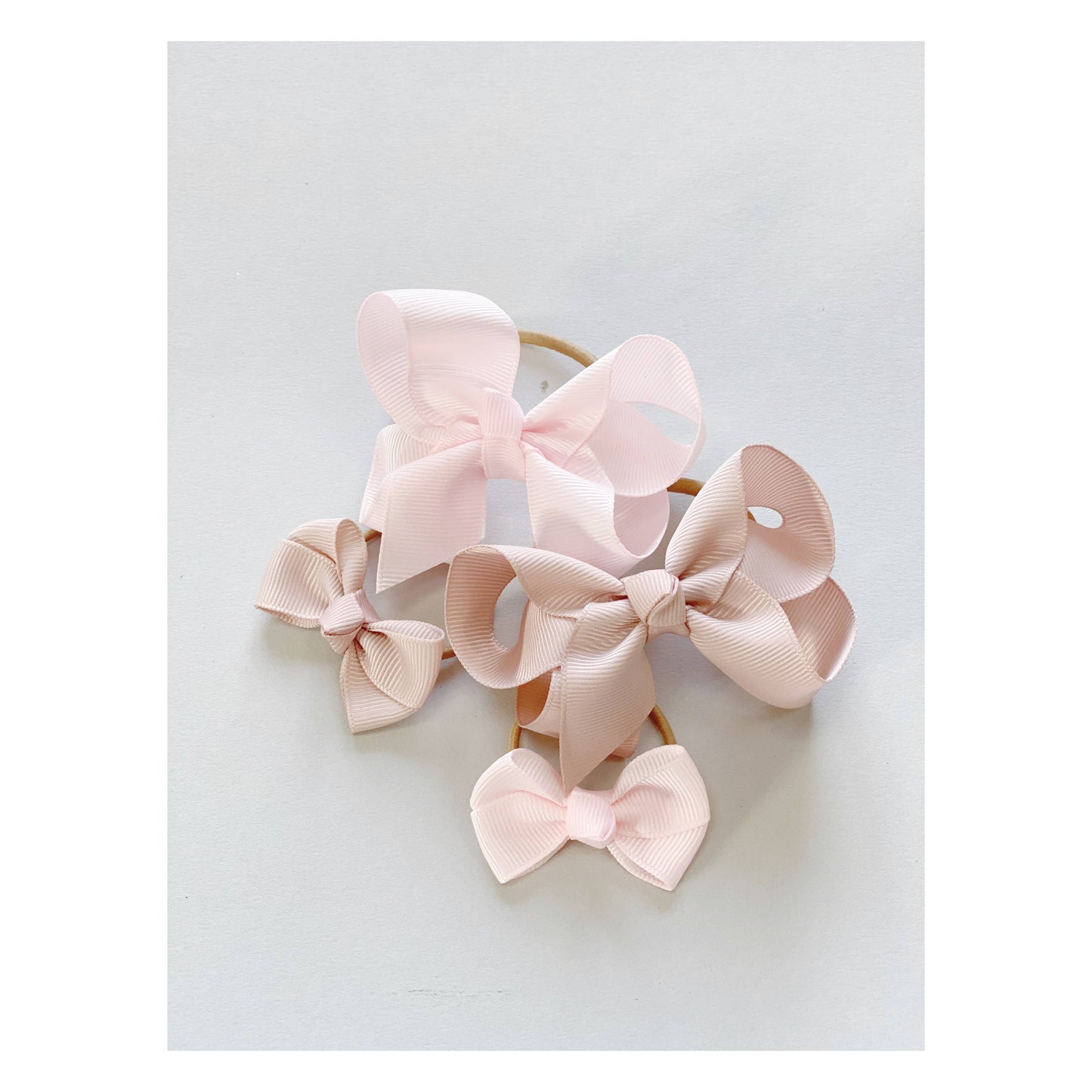 Estelle hårstrikk med sløyfe rosa